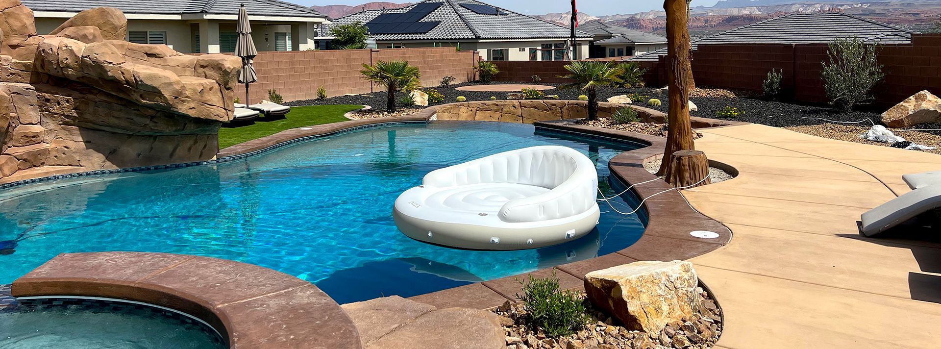 Stunning pool and patio by South Valley Landscaping